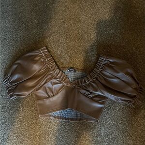 Olivaceous top